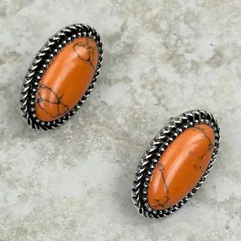 Silver w/orange stone